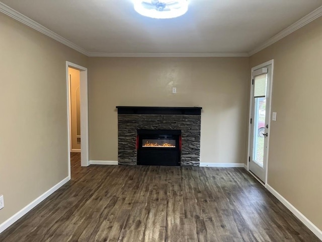 unfurnished living room with a stone fireplace, dark hardwood / wood-style floors, and ornamental molding