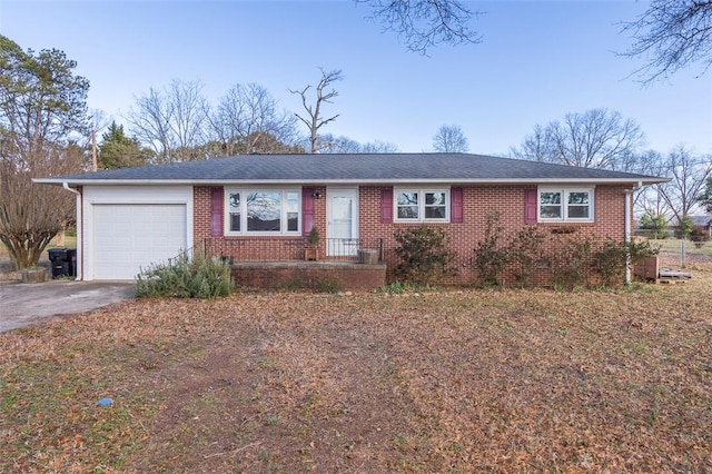 single story home featuring a garage