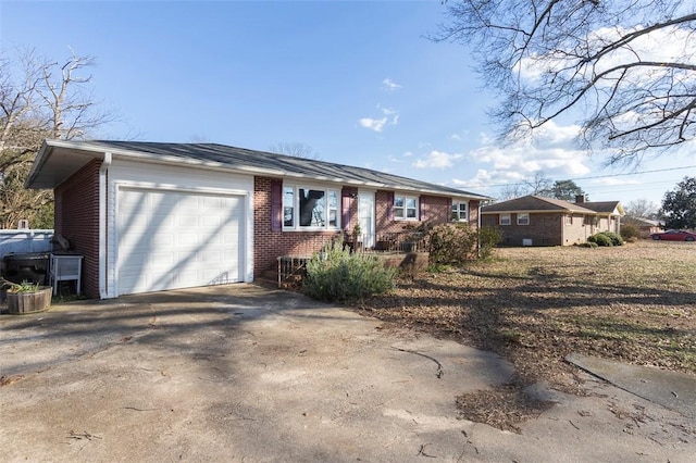 single story home featuring a garage