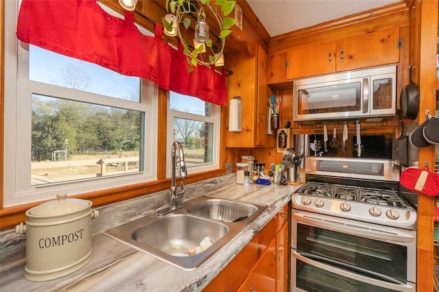 kitchen featuring sink and appliances with stainless steel finishes