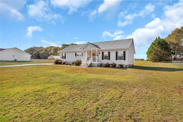 view of front facade with a porch and a front lawn