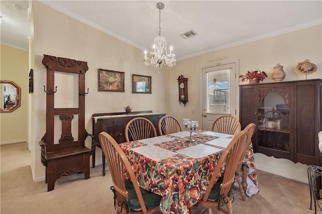 carpeted dining space featuring a chandelier and crown molding