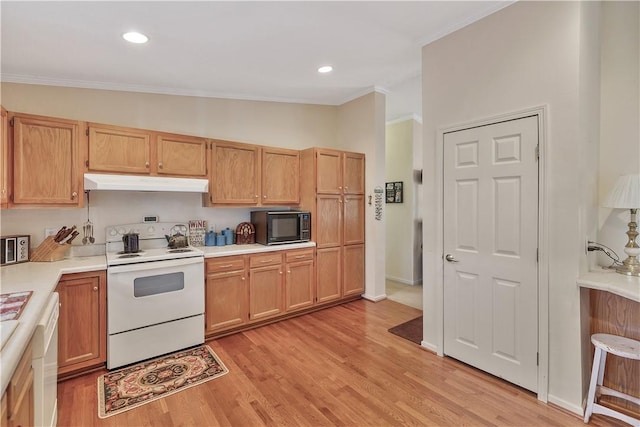 kitchen featuring light brown cabinetry, ornamental molding, white appliances, light hardwood / wood-style floors, and lofted ceiling