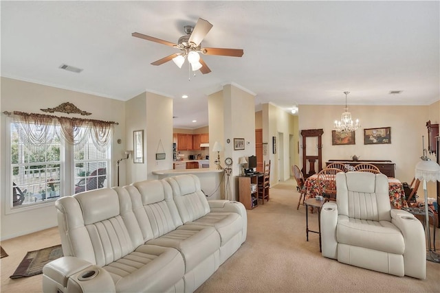 living room with crown molding, light colored carpet, and ceiling fan with notable chandelier