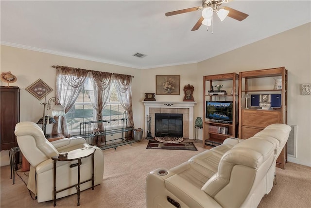 carpeted living room with ceiling fan, a fireplace, and lofted ceiling