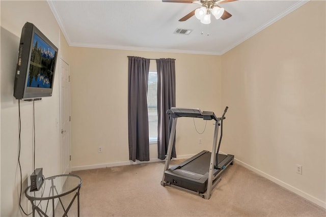 workout area with light carpet, ceiling fan, and ornamental molding