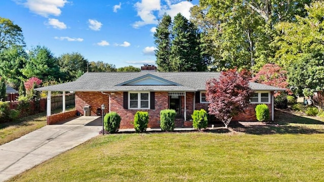 single story home featuring a carport and a front lawn