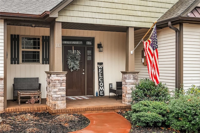 doorway to property with covered porch