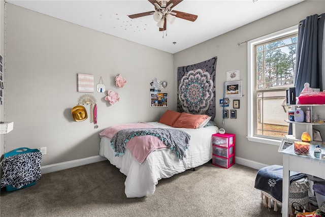 carpeted bedroom featuring ceiling fan