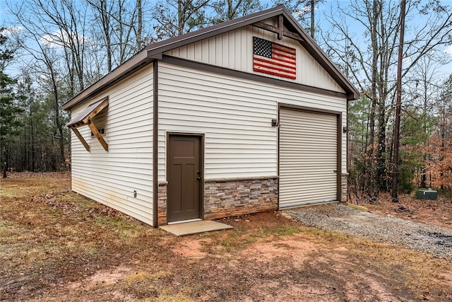 view of outbuilding featuring a garage