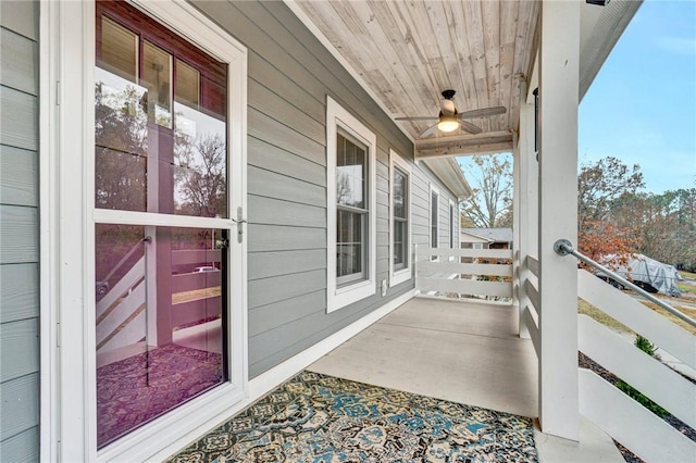 view of patio featuring ceiling fan and covered porch