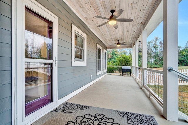 view of patio / terrace with area for grilling and a porch