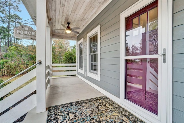 exterior space featuring ceiling fan