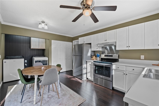 kitchen with white cabinets, appliances with stainless steel finishes, dark hardwood / wood-style floors, and ornamental molding