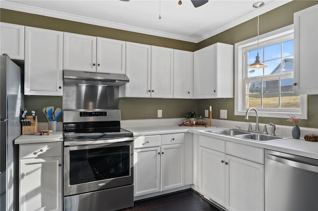 kitchen featuring white cabinetry, sink, ornamental molding, and appliances with stainless steel finishes