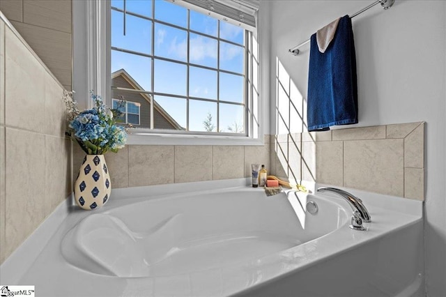 bathroom featuring a washtub