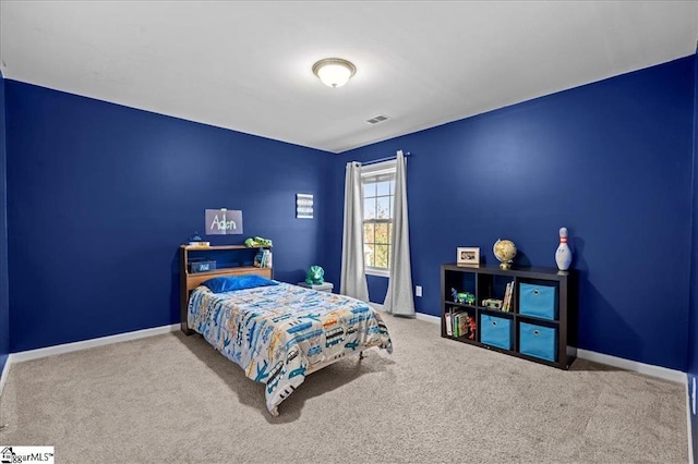 bedroom featuring carpet