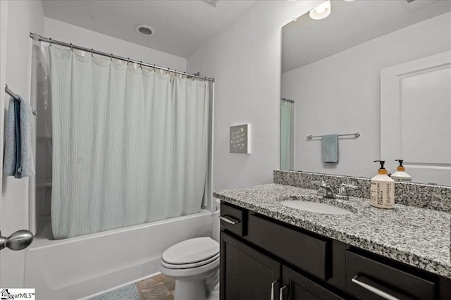 full bathroom featuring vanity, shower / bath combination with curtain, and toilet