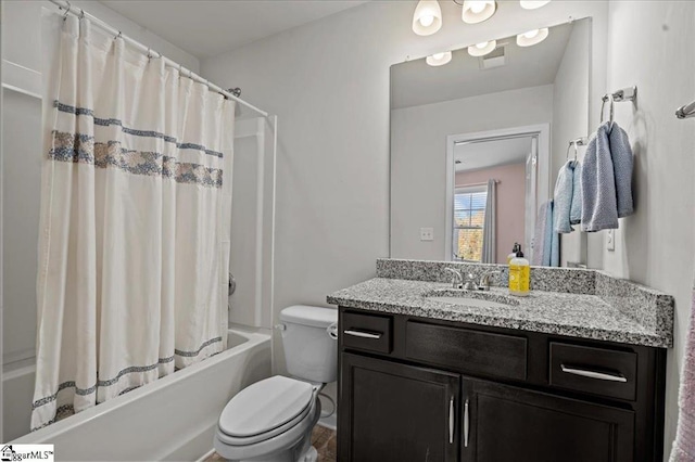 full bathroom featuring vanity, shower / tub combo, and toilet