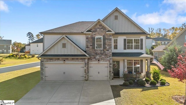 craftsman-style house with a garage and a front lawn