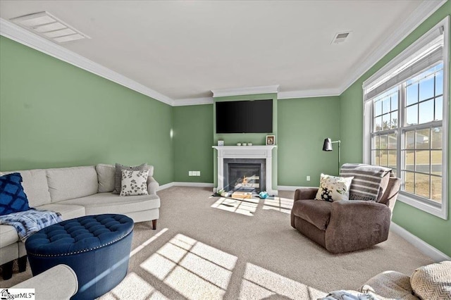 carpeted living room featuring ornamental molding