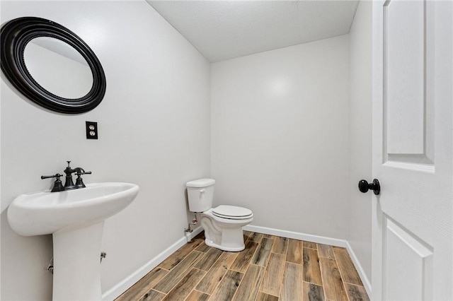 bathroom with sink and toilet