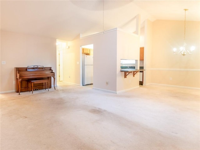 living room featuring carpet floors, high vaulted ceiling, and a notable chandelier