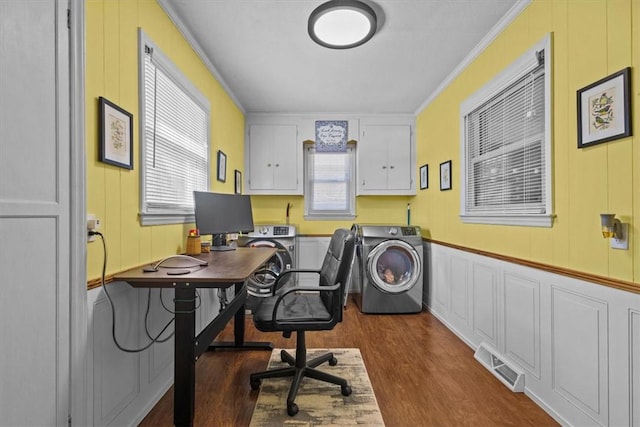 office space featuring dark hardwood / wood-style floors, ornamental molding, and independent washer and dryer