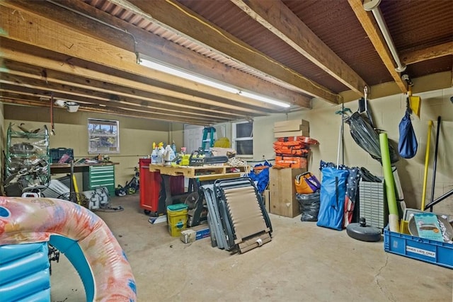 basement with a workshop area