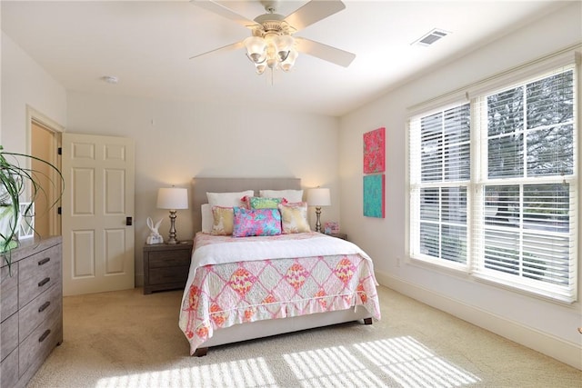 carpeted bedroom featuring ceiling fan