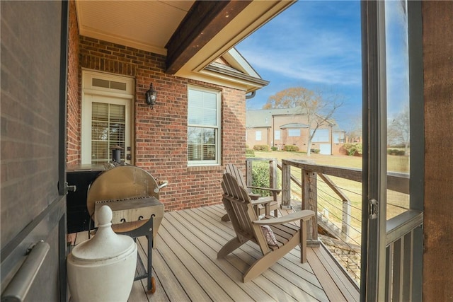 wooden deck featuring covered porch