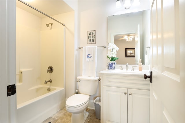 full bathroom featuring toilet, vanity, and tub / shower combination