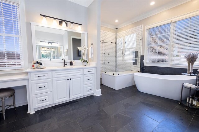 bathroom with vanity, crown molding, and shower with separate bathtub