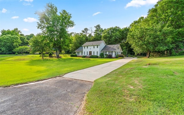 view of front of home with a front lawn