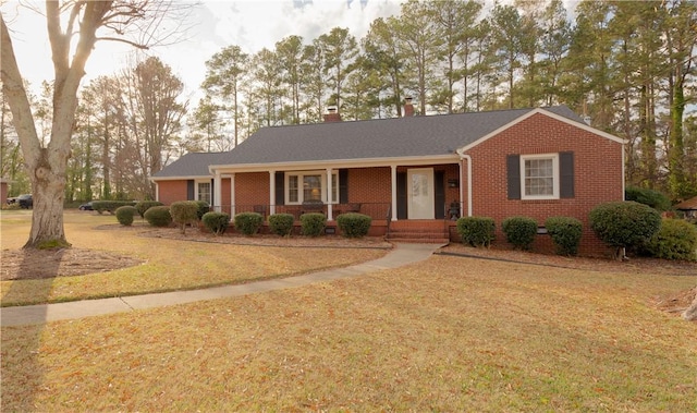 single story home featuring a front yard and a porch