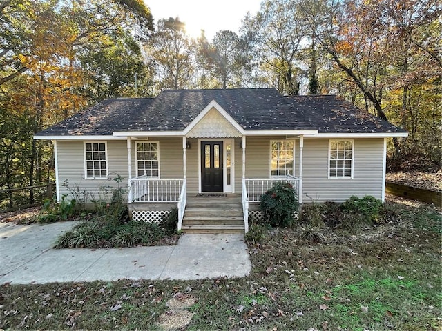 view of front of property featuring covered porch