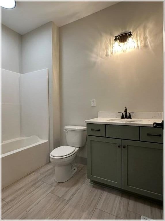 full bathroom featuring vanity, toilet, and shower / washtub combination