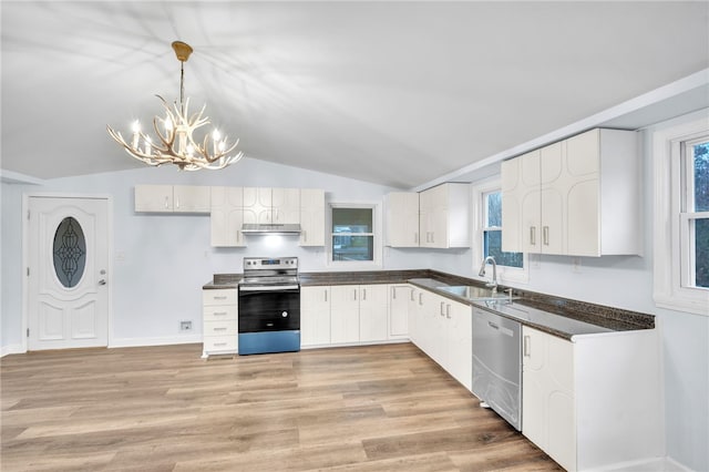 kitchen with white cabinetry, sink, stainless steel appliances, an inviting chandelier, and pendant lighting