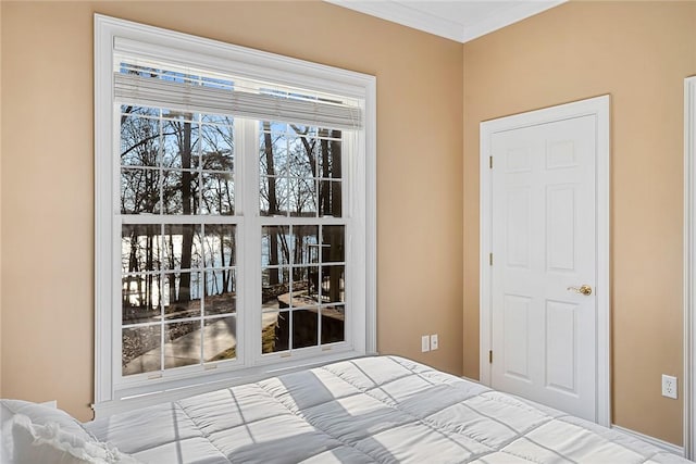 unfurnished bedroom with crown molding