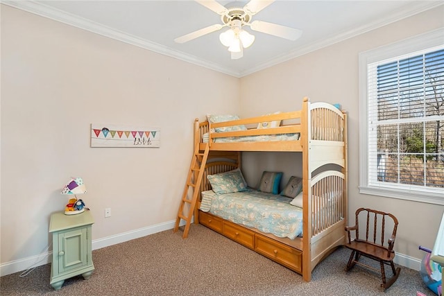 bedroom featuring multiple windows, carpet flooring, ceiling fan, and crown molding