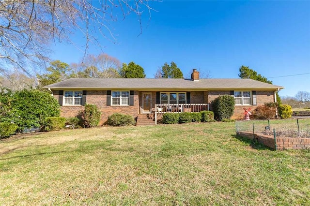 single story home with a front lawn