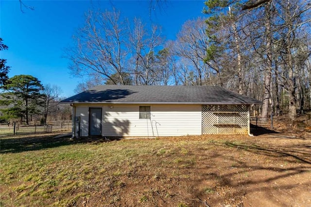 view of home's exterior with a lawn