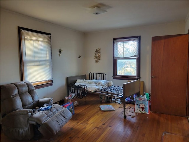 bedroom featuring hardwood / wood-style flooring