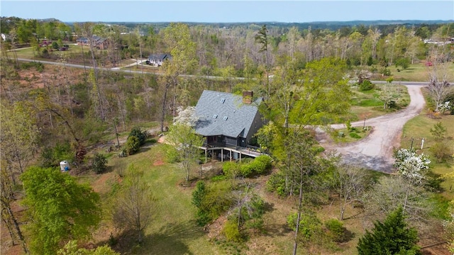 aerial view with a wooded view