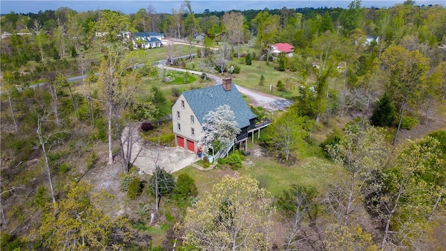 bird's eye view with a view of trees