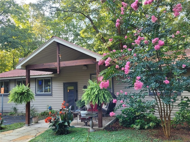 view of front of house with a patio area