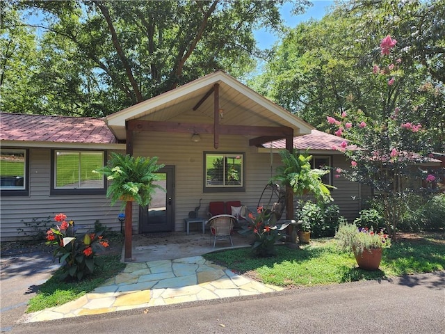 view of front of home featuring a patio