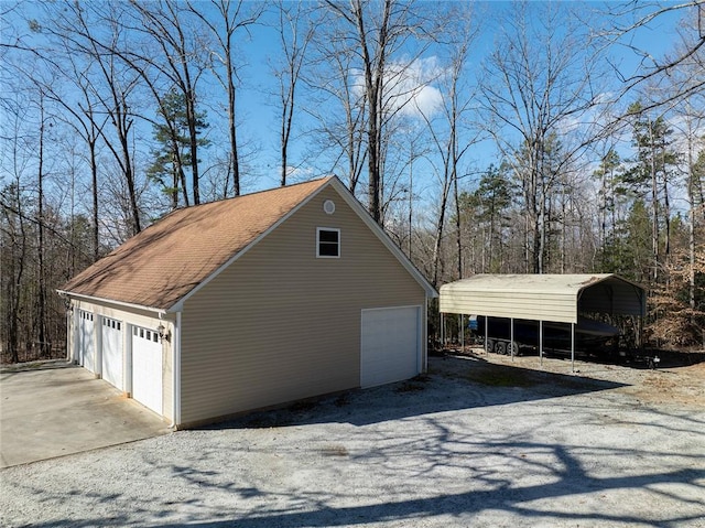 garage with a carport