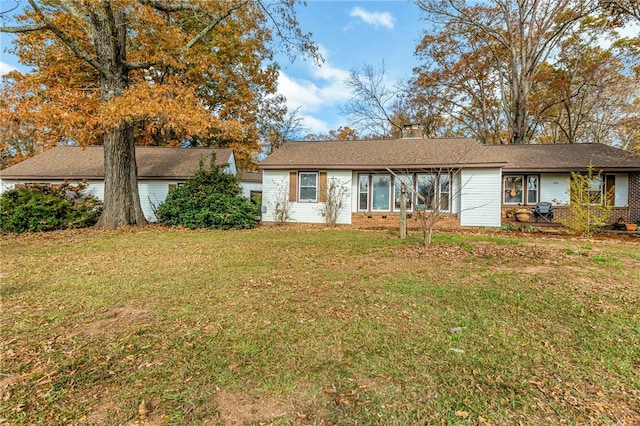 single story home featuring a front yard