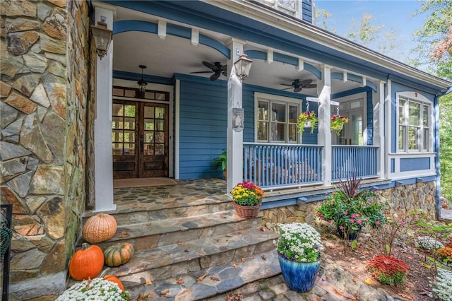 doorway to property featuring ceiling fan and covered porch